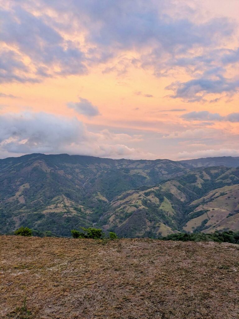 Orange, pink and grey colors of the sunset over the Mountains of La Unión