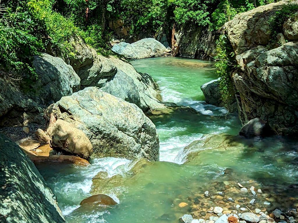 Turquoise waters of the Aranjuez River during rainy season at Boquerones area.