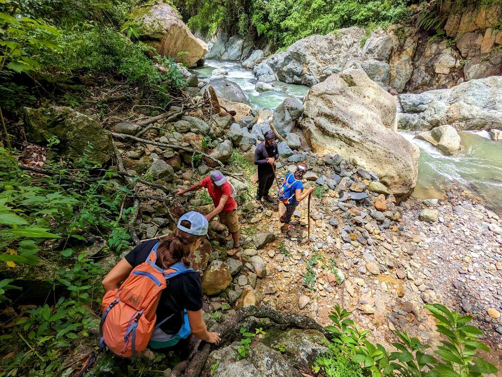 Travelers descending into the Aranjuez River Canyon during the Boquerones Hike.
