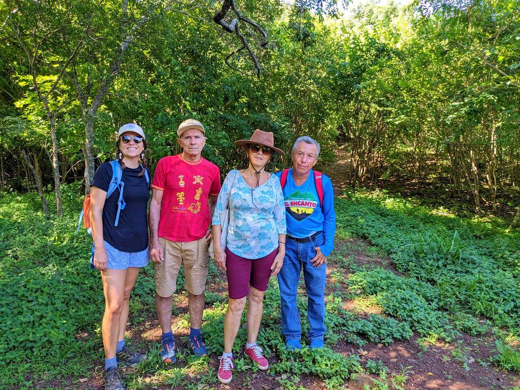 Hikers with their Baquiano guide on the El Encanto trail towards Aranjuez River Canyon.