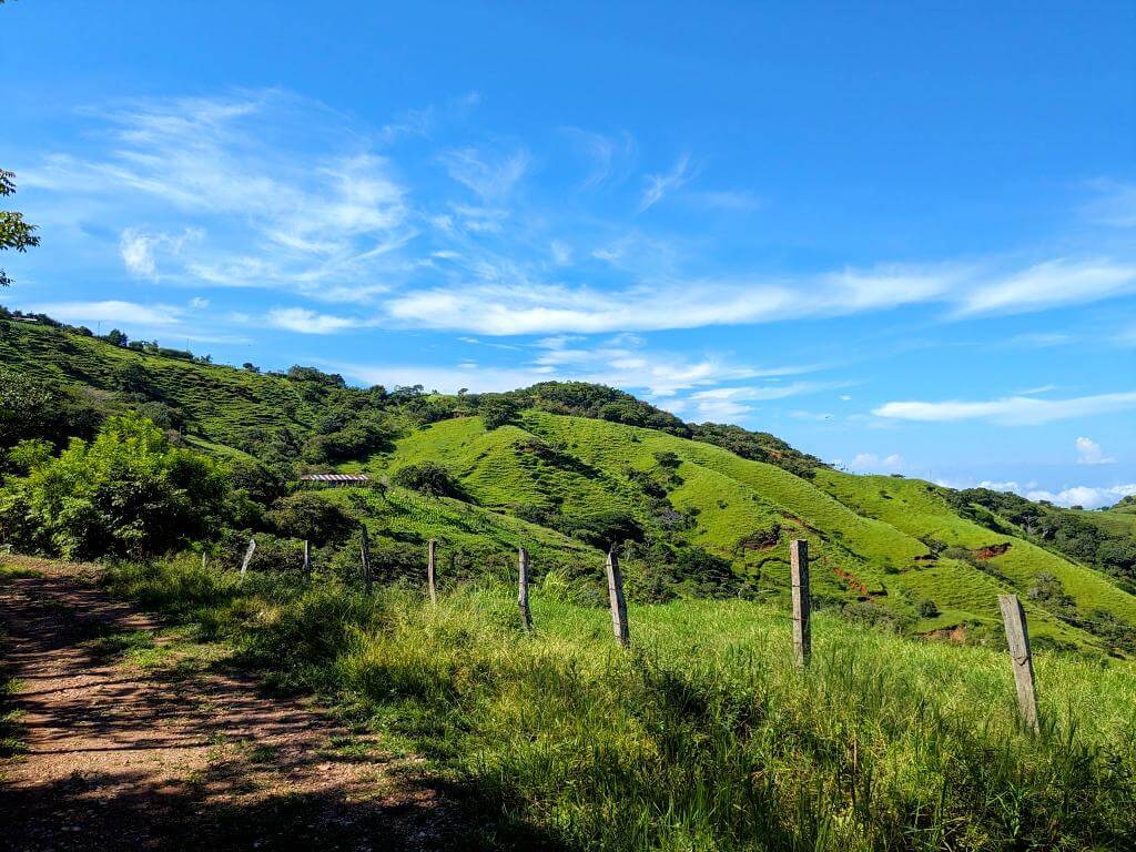 Dirt path leading to the trailhead of El Encanto Hike.