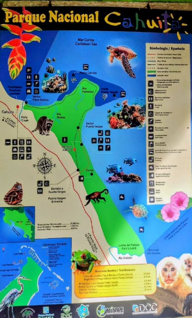 Illustrated map of Cahuita National Park showcasing points of interest, trail paths, and symbols representing the diverse flora and fauna.