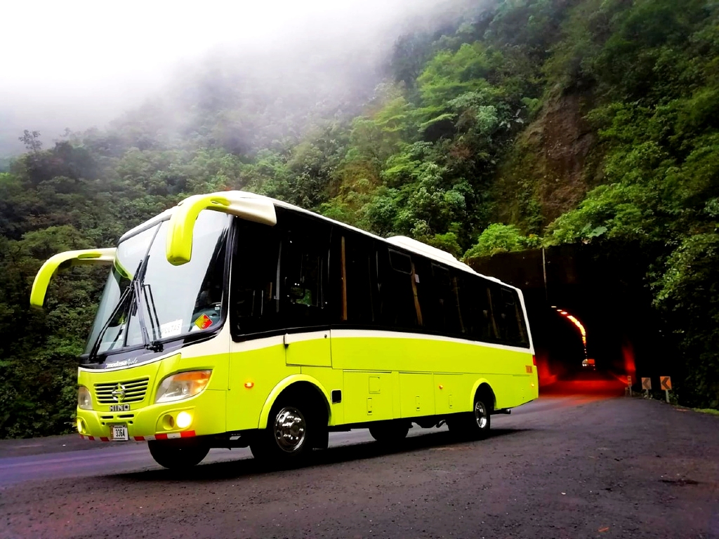 Spacious minibus for 28 passengers with ample luggage storage, A/C, reclining seats, and current insurance.