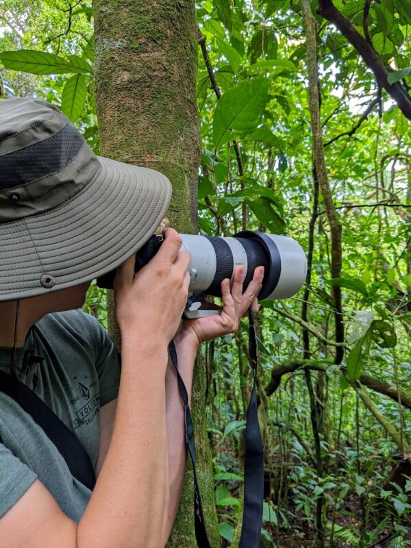 Wilson Salas Jiménez, an experienced Costa Rican naturalist and avid birdwatcher, founder of AmazonaBirdLife, capturing a picture during a birdwatching tour.