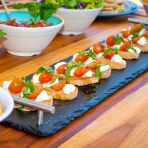 Close up of a delicious menu organized on a boat tour, with fresh and appetizing food.