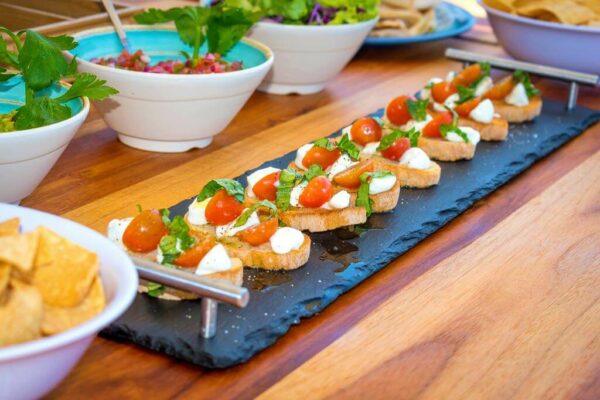 Close up of a delicious menu organized on a boat tour, with fresh and appetizing food.