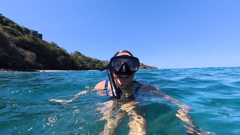 Guest snorkeling after an intertidal and marine exploration tour with Link Expeditions in Guanacaste, Costa Rica